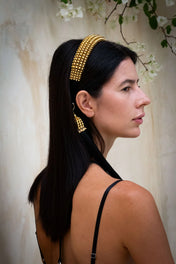 Woman wear Teuta Headband gold from side view in neutral background by Object & Dawn