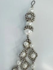 ghost image handcrafted modular trinity medallions in pearl by object and dawn close up