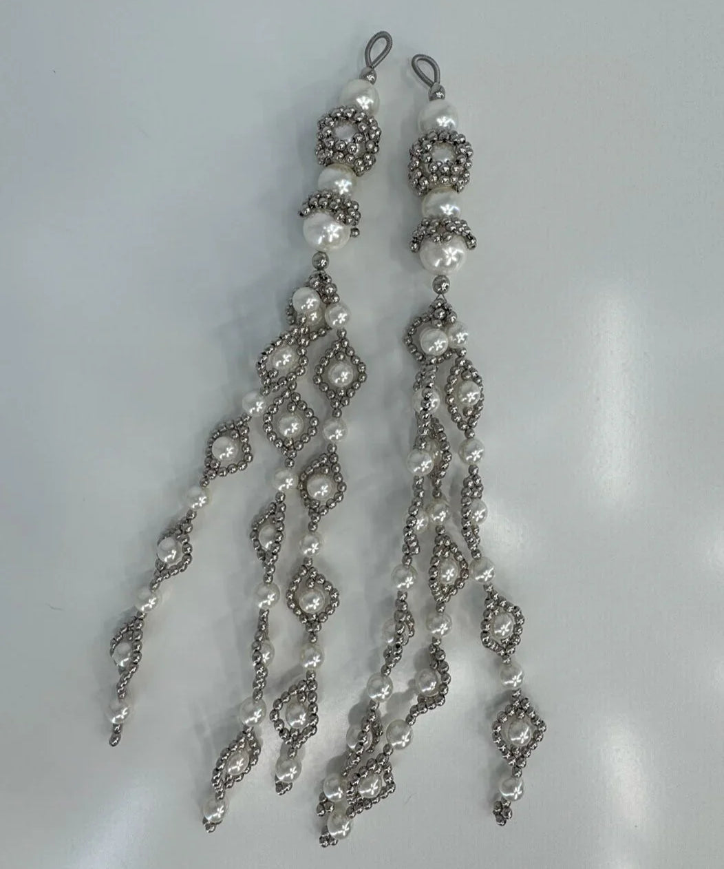 ghost image handcrafted modular trinity medallions in pearl by object and dawn