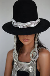 Beaded modular hat accessory from polymer metal beads and syntethis japananese pearl by object and dawn on neutral background