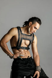 Man wears beaded Yasuke Leather Harness with bracelets and cuffs in silver, handcrafted modular design, worn front look by object and dawn