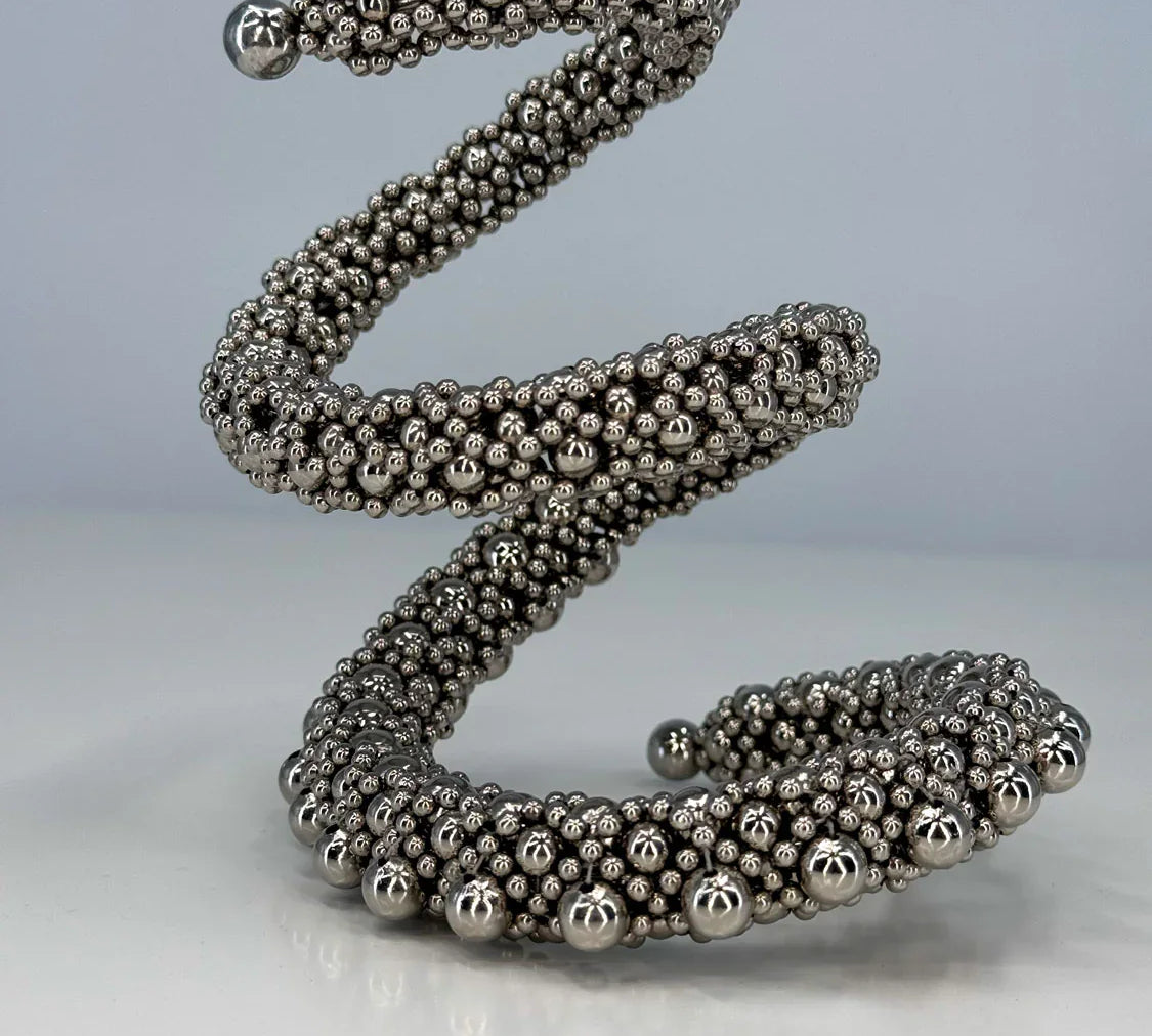 Object & Dawn beaded Zeitan Spiral Cuff in silver, premium handcrafted accessory, ghost image in white back ground