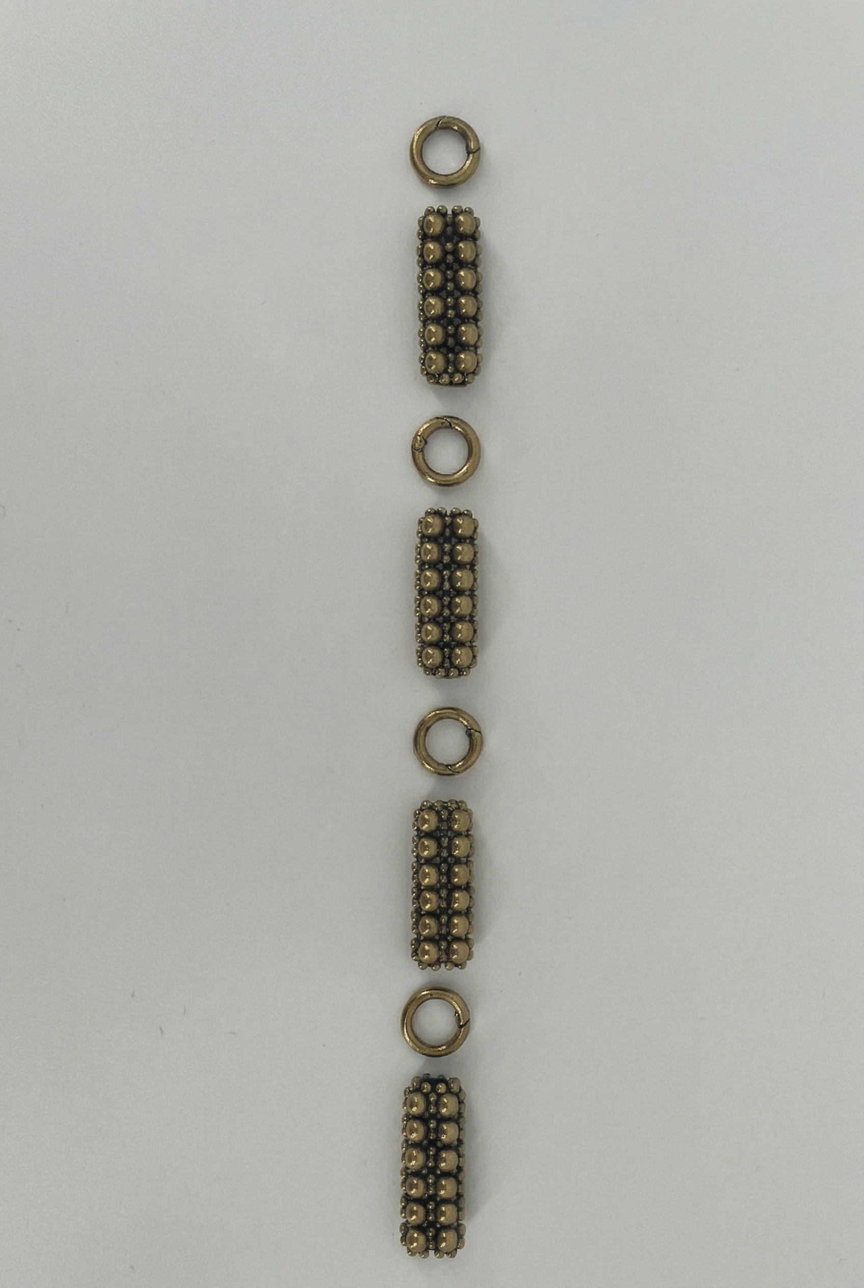 Object & Dawn headband featuring antique gold intricate beaded link with unconected claps craftsmanship