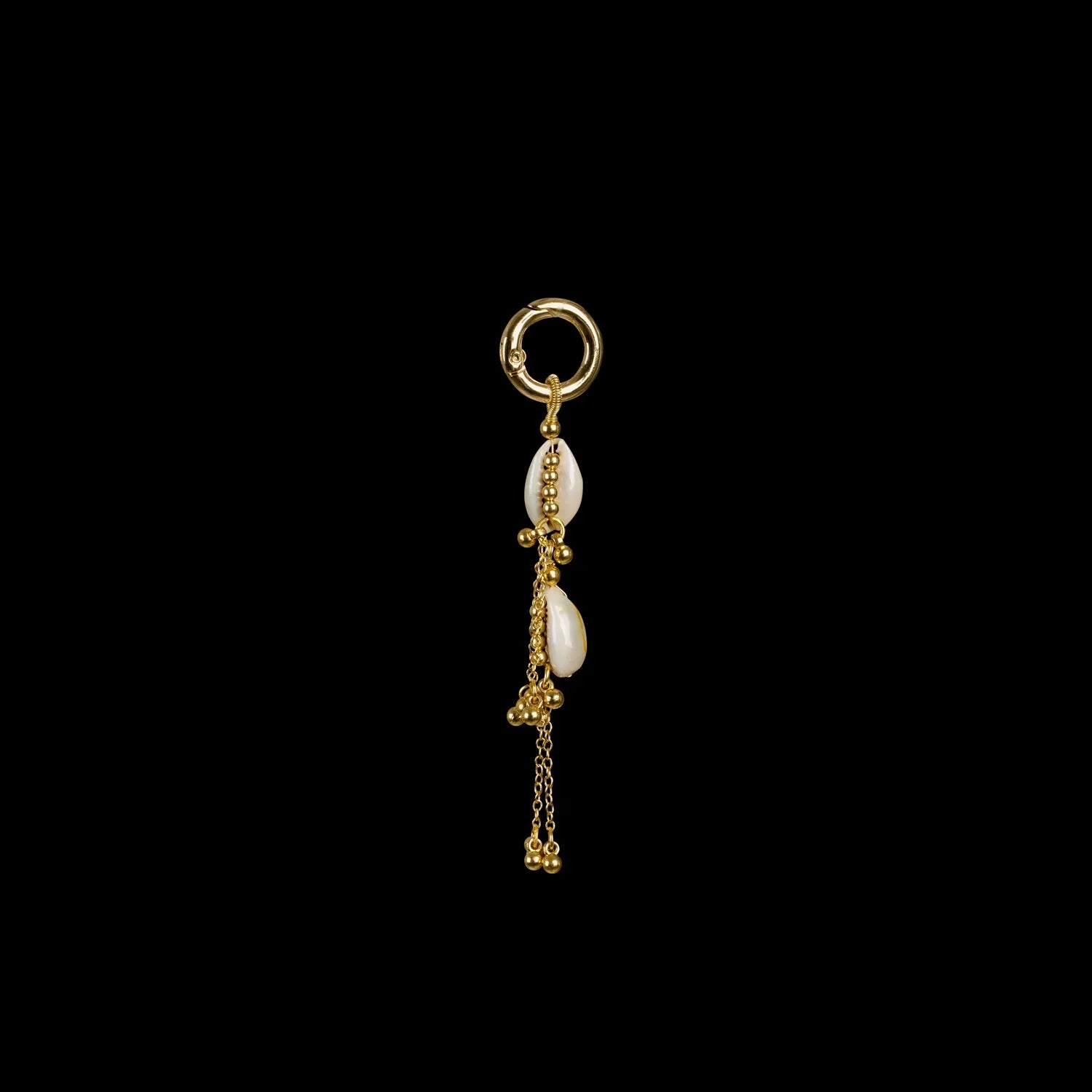 beaded shell tassel in gold by object and dawn