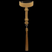 Gold beaded T-shaped choker with a tassel on a black background by Object & Dawn