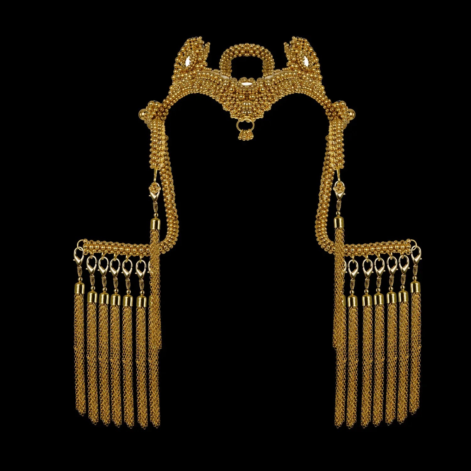 handcrafted modular jas headpiece system with 22k gold wash on polymer beads with removable chain tassels on black background