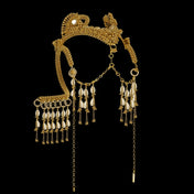 modular beaded jas headpiece system from 22 gold washed metal beads with shell beaded tassel from object and dawn in black background diagonal view